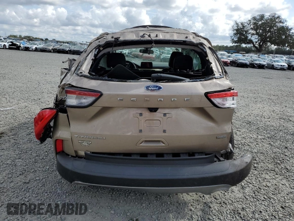 2021 Ford Escape Titanium Hybrid z VIN 1FMCU0DZXMUB05228, wystawiony jako Copart lot #44167735 z przebiegiem Nie podano mil oraz Nie do naprawy • Non repairable. Historia ofert i sprzedaży dostępna na DreamBid. Obrazek 6.