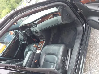 2002 Cadillac DeVille DTS z VIN 1G6KF579320288667, wystawiony jako IAAI lot #42331236 z przebiegiem 71 189 mil mil oraz . Historia ofert i sprzedaży dostępna na DreamBid. Obrazek 5.