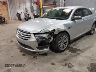 2013 Ford Taurus Limited with VIN 1FAHP2F83DG116657, listed as a IAAI auction lot 41533075 with 124,649 mi miles. Bid and sale history available at carsss.com. Image 6.