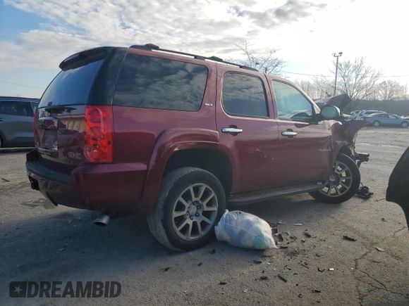 2009 GMC Yukon SLT w/4SA with VIN 1GKFK330X9R207168, listed as a Copart auction lot 85997244 with 123,227 mi miles and Salvage Title. Bid and sale history available at carsss.com. Image 3.