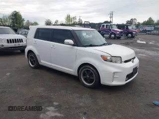 2014 Scion xB with VIN JTLZE4FE6EJ066349, listed as a IAAI auction lot 42045307 with 165,144 mi miles. Bid and sale history available at carsss.com. Image 1.