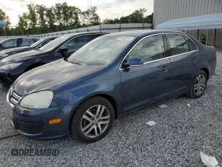 2005 Volkswagen Jetta 2.5L with VIN 3VWDG71K65M606300, listed as a Copart auction lot 57848515 with 108,928 mi miles and Salvage title. Bid and sale history available at DreamBid. Image 1.
