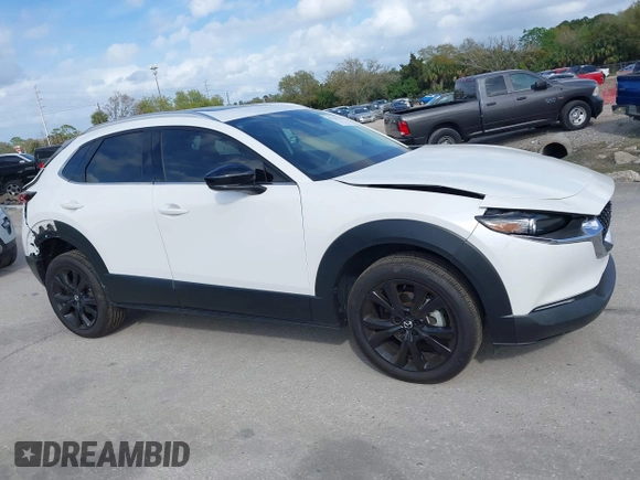 2022 Mazda CX-30 2.5 Turbo Premium Package with VIN 3MVDMBDY3NM437897, listed as a IAAI auction lot 41715776 with 42,771 mi miles. Bid and sale history available at carsss.com. Image 13.