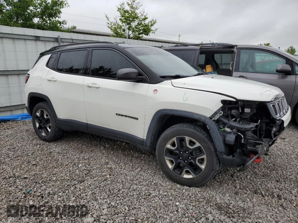 2017 Jeep Compass Trailhawk with VIN 3C4NJDDB2HT646693, listed as a Copart auction lot 58200235 with 62,765 mi miles and Salvage title. Bid and sale history available at DreamBid. Image 4.