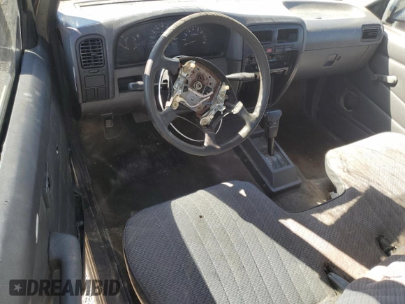 1997 Nissan Frontier XE with VIN 1N6SD11S2VC383896, listed as a Copart auction lot 50420165 with 285,970 mi miles and Salvage title. Bid and sale history available at DreamBid. Image 8.