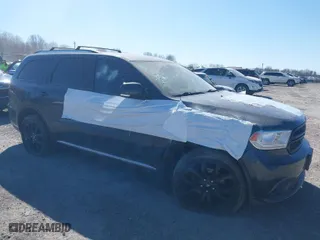 2014 Dodge Durango Limited with VIN 1C4RDJDG5EC477408, listed as a IAAI auction lot 41853698 with 186,812 mi miles. Bid and sale history available at carsss.com. Image 1.