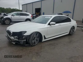 2017 BMW 7 Series 750i with VIN WBA7F0C34HGM21478, listed as a Copart auction lot 48116435 with 76,617 mi miles and Salvage Title. Bid and sale history available at carsss.com. Image 1.