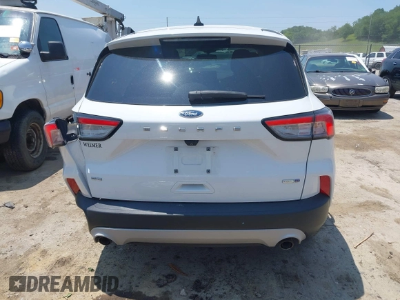 2020 Ford Escape SE z VIN 1FMCU9G63LUA85246, wystawiony jako IAAI lot #42414015 z przebiegiem 54 578 mil mil oraz . Historia ofert i sprzedaży dostępna na DreamBid. Obrazek 17.