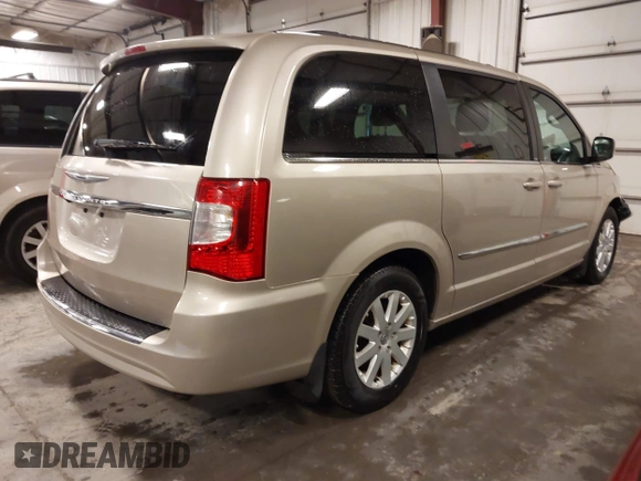 2014 Chrysler Town & Country Touring with VIN 2C4RC1BG3ER295722, listed as a IAAI auction lot 41705820 with 142,587 mi miles and . Bid and sale history available at DreamBid. Image 4.