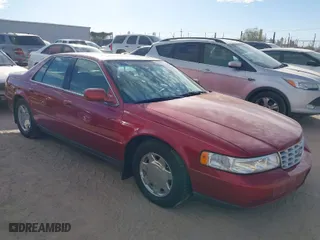 1999 Cadillac Seville Luxury SLS with VIN 1G6KS54Y8XU937328, listed as a IAAI auction lot 41204894 with 282,968 mi miles. Bid and sale history available at carsss.com. Image 1.