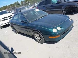 1999 Acura Integra LS with VIN JH4DB7658XS002311, listed as a IAAI auction lot 41697843 with 235,682 mi miles and . Bid and sale history available at DreamBid. Image 1.