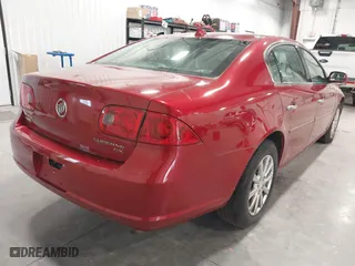 2009 Buick Lucerne CX with VIN 1G4HP57M59U103176, listed as a IAAI auction lot 41914931 with 164,743 mi miles. Bid and sale history available at carsss.com. Image 4.