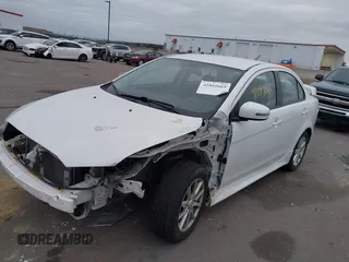 2016 Mitsubishi Lancer SE with VIN JA32V2FWXGU003619, listed as a IAAI auction lot 41041665 with 98,627 mi miles. Bid and sale history available at carsss.com. Image 17.
