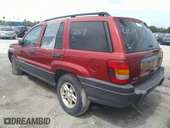 2004 Jeep Grand Cherokee Laredo with VIN 1J4GW48SX4C160475, listed as a IAAI auction lot 36500183 with 189,047 mi miles and . Bid and sale history available at DreamBid. Image 3.