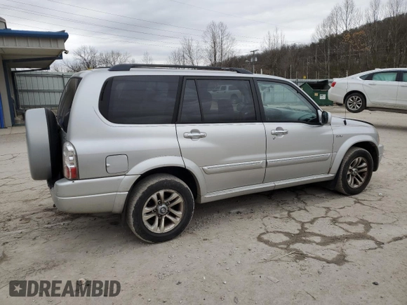 2005 Suzuki XL7 LX with VIN JS3TX92V654108114, listed as a Copart auction lot 81158564 with 130,384 mi miles and Salvage title. Bid and sale history available at DreamBid. Image 3.