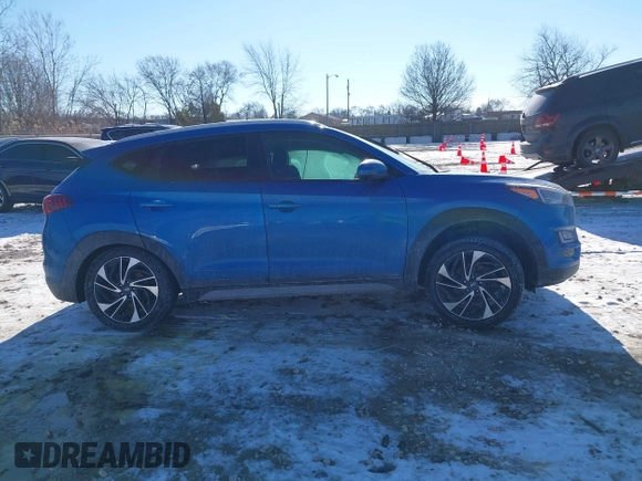2019 Hyundai Tucson Sport with VIN KM8J33ALXKU857925, listed as a IAAI auction lot 41369786 with 41,365 mi miles. Bid and sale history available at carsss.com. Image 13.