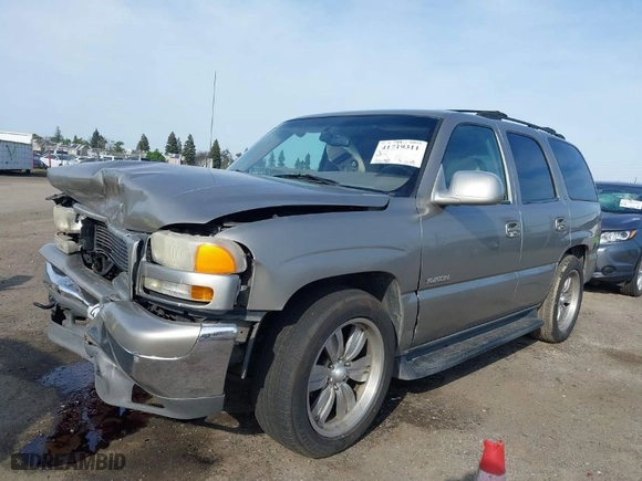 2001 GMC Yukon SLT with VIN 1GKEC13TX1J138735, listed as a IAAI auction lot 41719311 with 211,190 mi miles. Bid and sale history available at carsss.com. Image 14.