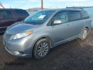 2017 Toyota Sienna LE with VIN 5TDJZ3DC9HS168079, listed as a IAAI auction lot 41175845 with 98,585 mi miles. Bid and sale history available at carsss.com. Image 2.
