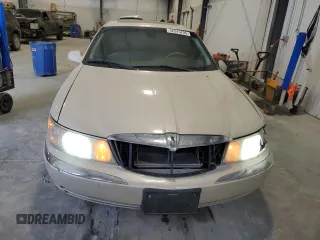 2002 Lincoln Continental with VIN 1LNHM97VX2Y694578, listed as a Copart auction lot 42245705 with 195,236 mi miles and Salvage Title. Bid and sale history available at carsss.com. Image 5.