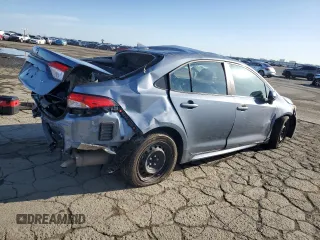 2021 Toyota Corolla LE with VIN 5YFEPMAE4MP267852, listed as a Copart auction lot 49284315 with 27,157 mi miles and Salvage Title. Bid and sale history available at DreamBid. Image 3.