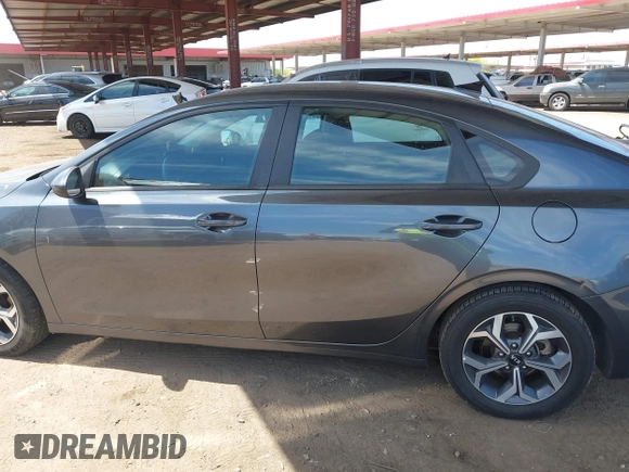 2021 Kia Forte LXS z VIN 3KPF24AD7ME294409, wystawiony jako IAAI lot #42124606 z przebiegiem 91 567 mil mil oraz . Historia ofert i sprzedaży dostępna na DreamBid. Obrazek 14.