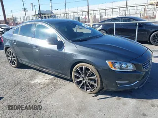 2016 Volvo S60 T5 Drive-E Premier with VIN YV126MFK2G2396190, listed as a IAAI auction lot 41682077 with 114,057 mi miles. Bid and sale history available at carsss.com. Image 1.