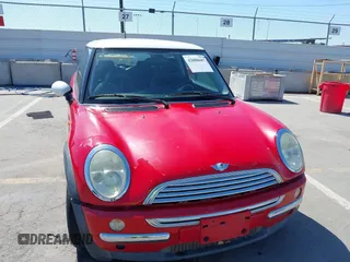 2004 MINI Hardtop with VIN WMWRC33484TC55840, listed as a IAAI auction lot 42088687 with 135,353 mi miles and . Bid and sale history available at DreamBid. Image 12.