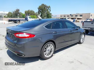 2015 Ford Fusion SE with VIN 3FA6P0H93FR238769, listed as a IAAI auction lot 42528718 with 117,719 mi miles and . Bid and sale history available at DreamBid. Image 4.
