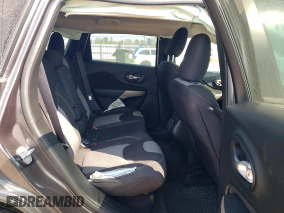 2017 Jeep Cherokee Sport z VIN 1C4PJMAB9HW579047, wystawiony jako Copart lot #52634653 z przebiegiem 64 950 mil mil oraz Szkoda całkowita • Salvage title. Historia ofert i sprzedaży dostępna na DreamBid. Obrazek 11.