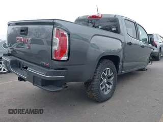 2022 GMC Canyon 4WD AT4 with VIN 1GTG6FENXN1187138, listed as a IAAI auction lot 41504228 with 2,901 mi miles and . Bid and sale history available at DreamBid. Image 4.