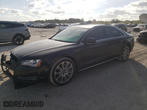 2013 Audi A8 3.0L with VIN WAUAGAFDXDN032766, listed as a Copart auction lot 84275944 with 127,388 mi miles and Salvage title. Bid and sale history available at DreamBid. Image 1.