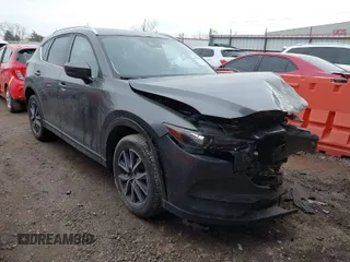 2018 Mazda CX-5 Touring with VIN JM3KFACM4J0428142, listed as a IAAI auction lot 41591095 with 119,109 mi miles. Bid and sale history available at carsss.com. Image 1.