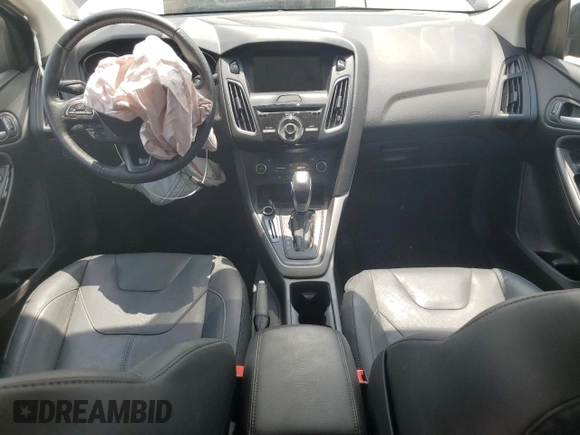 2016 Ford Focus SE z VIN 1FADP3F23GL288232, wystawiony jako Copart lot #62565095 z przebiegiem 11 634 mil mil oraz Szkoda całkowita • Salvage title. Historia ofert i sprzedaży dostępna na DreamBid. Obrazek 8.