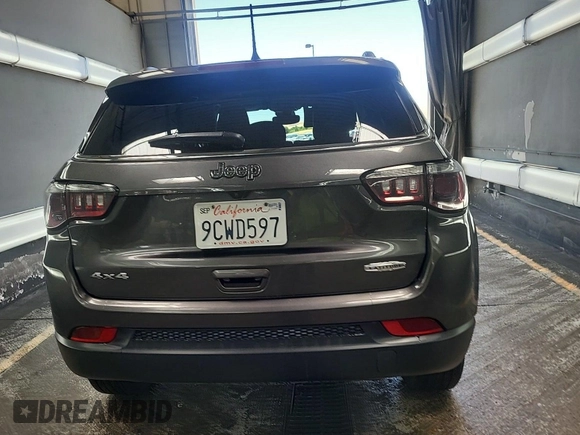 2022 Jeep Compass Latitude with VIN 3C4NJDBB3NT164524, listed as a IAAI auction lot 42678001 with 46,506 mi miles and . Bid and sale history available at DreamBid. Image 1.