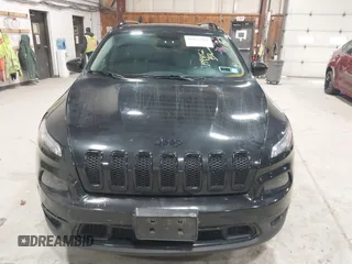 2014 Jeep Cherokee Latitude with VIN 1C4PJMCS6EW299532, listed as a IAAI auction lot 41833888 with 199,915 mi miles and . Bid and sale history available at DreamBid. Image 12.