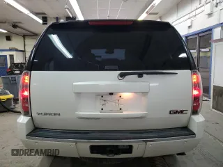 2014 GMC Yukon Denali with VIN 1GKS2EEF6ER141112, listed as a Copart auction lot 88526685 with 142,248 mi miles and Salvage Title. Bid and sale history available at carsss.com. Image 6.