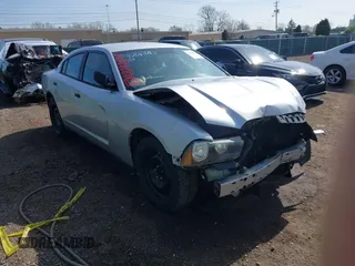 2013 Dodge Charger Police z VIN 2C3CDXAT9DH549866, wystawiony jako IAAI lot #42063862 z przebiegiem 145 191 mil mil oraz . Historia ofert i sprzedaży dostępna na DreamBid. Obrazek 1.