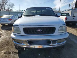 1997 Ford F-150 XL with VIN 1FTDX1866VKB08985, listed as a Copart auction lot 43708935 with 208,670 mi miles and Salvage title. Bid and sale history available at DreamBid. Image 5.