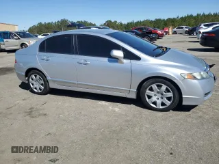 2010 Honda Civic LX with VIN 2HGFA1F51AH306669, listed as a Copart auction lot 50450825 with 143,659 mi miles and Salvage Title. Bid and sale history available at DreamBid. Image 4.