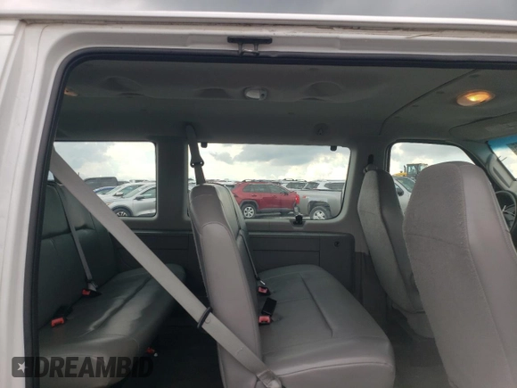 2008 Ford Econoline Passenger XL with VIN 1FMNE11W58DB33613, listed as a Copart auction lot 59142445 with 70,107 mi miles and Salvage title. Bid and sale history available at DreamBid. Image 11.