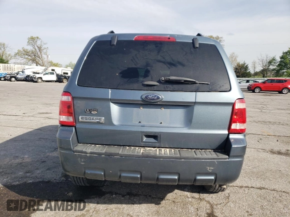 2012 Ford Escape XLT z VIN 1FMCU0D71CKA38530, wystawiony jako Copart lot #54211035 z przebiegiem 136 193 mil mil oraz Szkoda całkowita • Salvage title. Historia ofert i sprzedaży dostępna na DreamBid. Obrazek 6.