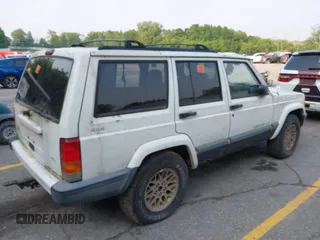 1999 Jeep Cherokee Sport z VIN 1J4FF68S0XL663735, wystawiony jako IAAI lot #42463562 z przebiegiem Nie podano mil oraz . Historia ofert i sprzedaży dostępna na DreamBid. Obrazek 4.