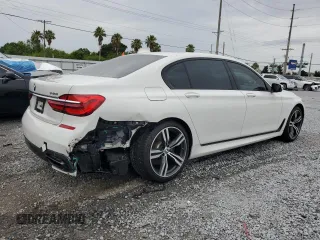 2016 BMW 7 Series 740i with VIN WBA7E2C52GG547112, listed as a Copart auction lot 63069355 with 76,867 mi miles and Salvage title. Bid and sale history available at DreamBid. Image 3.