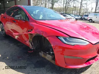 2021 Tesla Model S Long Range z VIN 5YJSA1E51MF436329, wystawiony jako IAAI lot #41918018 z przebiegiem 44 029 mil mil oraz . Historia ofert i sprzedaży dostępna na DreamBid. Obrazek 6.
