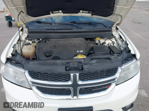 2018 Dodge Journey SXT with VIN 3C4PDCBG4JT369687, listed as a IAAI auction lot 42269696 with 131,306 mi miles and . Bid and sale history available at DreamBid. Image 10.