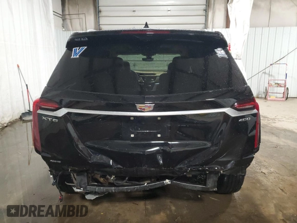 2022 Cadillac XT6 Premium Luxury with VIN 1GYKPFRS0NZ154930, listed as a Copart auction lot 88454595 with 26,334 mi miles and Salvage Title. Bid and sale history available at carsss.com. Image 6.