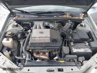 2002 Toyota Avalon XL with VIN 4T1BF28B92U240017, listed as a IAAI auction lot 41673494 with 209,928 mi miles. Bid and sale history available at carsss.com. Image 10.