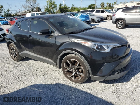 2019 Toyota C-HR XLE z VIN JTNKHMBX9K1016158, wystawiony jako Copart lot #54121995 z przebiegiem 119 716 mil mil oraz Szkoda całkowita • Salvage title. Historia ofert i sprzedaży dostępna na DreamBid. Obrazek 4.