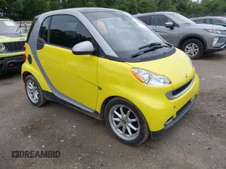 2008 Smart fortwo Pure z VIN WMEEJ31X28K133599, wystawiony jako IAAI lot #42522306 z przebiegiem 134 844 mil mil oraz . Historia ofert i sprzedaży dostępna na DreamBid. Obrazek 1.