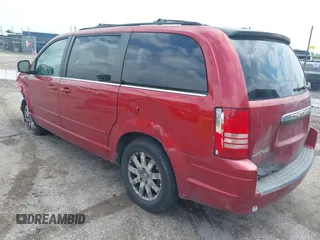 2008 Chrysler Town & Country Touring with VIN 2A8HR54P58R662471, listed as a IAAI auction lot 42457519 with 194,331 mi miles and . Bid and sale history available at DreamBid. Image 3.